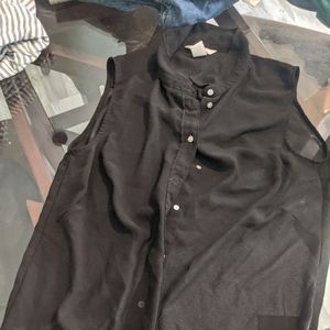 Sheer black blouse